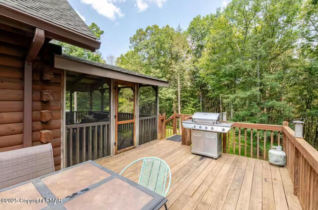 view of snow covered deck