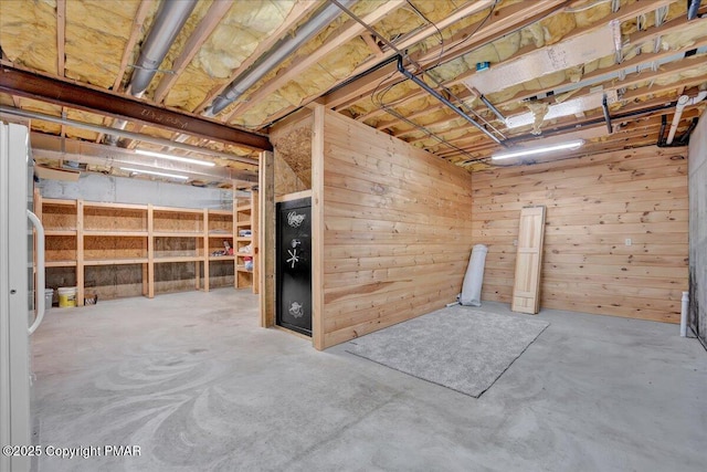 interior space featuring wood walls