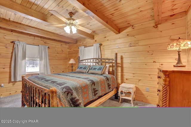 bedroom featuring beamed ceiling, wood ceiling, wooden walls, and carpet