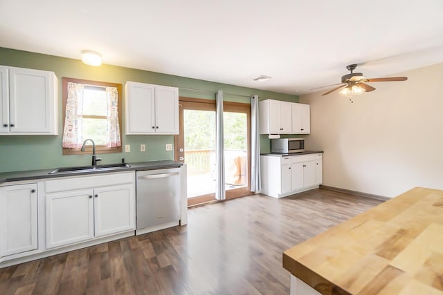2227 Cheyenne Dr, Blakeslee, PA 18610 - kitchen featuring appliances with stainless steel finishes, plenty of natural light, and dark wood-style floors