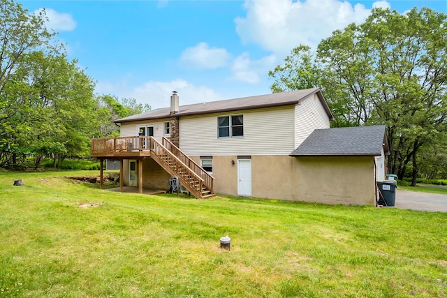 2227 Cheyenne Dr, Blakeslee, PA 18610 - back of house featuring stairway, a deck, a yard, and a chimney