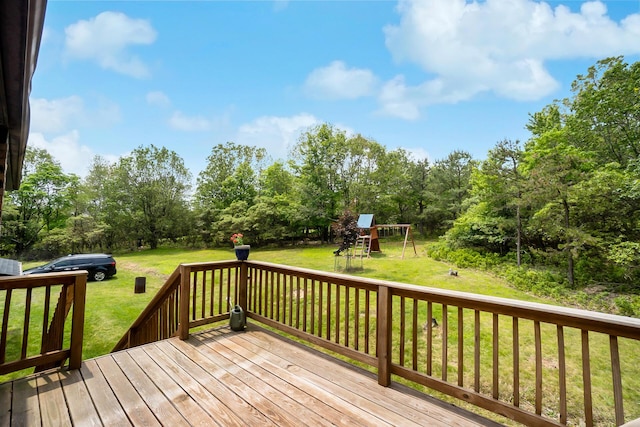 2227 Cheyenne Dr, Blakeslee, PA 18610 - wooden terrace with a lawn, a playground, and view of scattered trees