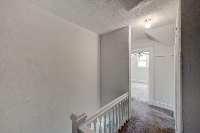 1198 W Main St, Stroudsburg, PA 18360 - hall featuring an upstairs landing, a textured ceiling, carpet, lofted ceiling, and a textured wall