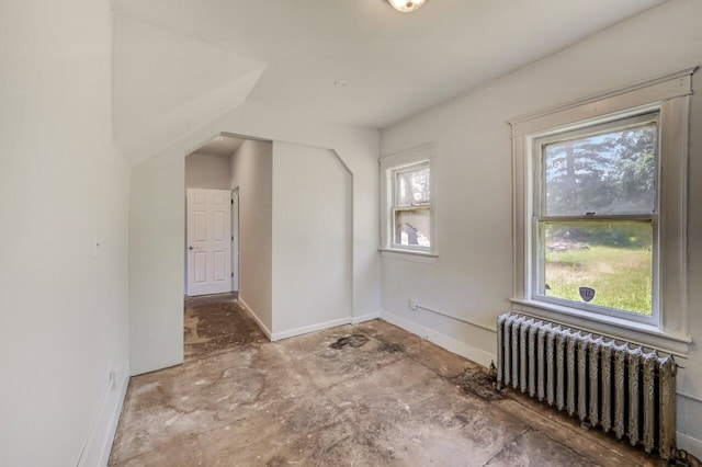 1198 W Main St, Stroudsburg, PA 18360 - empty room with radiator heating unit and baseboards