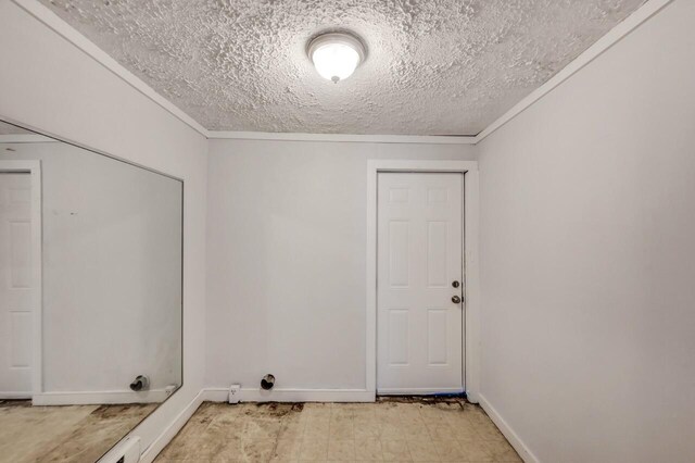 1198 W Main St, Stroudsburg, PA 18360 - empty room with a textured ceiling and ornamental molding