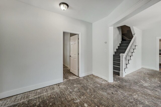 1198 W Main St, Stroudsburg, PA 18360 - empty room with stairs and baseboards