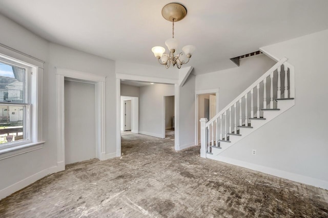 1198 W Main St, Stroudsburg, PA 18360 - entryway with plenty of natural light, a chandelier, and stairs