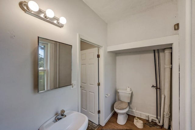 1198 W Main St, Stroudsburg, PA 18360 - bathroom featuring toilet and wood finished floors