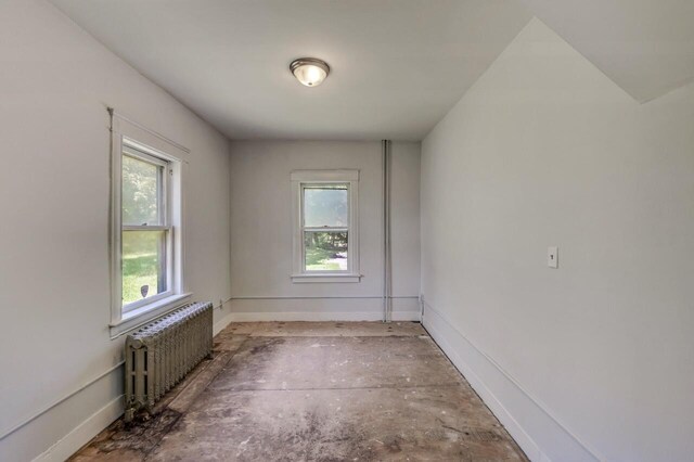 1198 W Main St, Stroudsburg, PA 18360 - spare room featuring radiator and baseboards