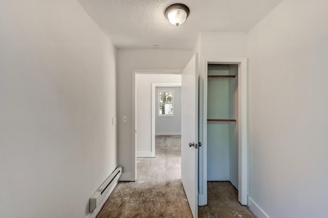 1198 W Main St, Stroudsburg, PA 18360 - hallway with a baseboard radiator and a textured ceiling