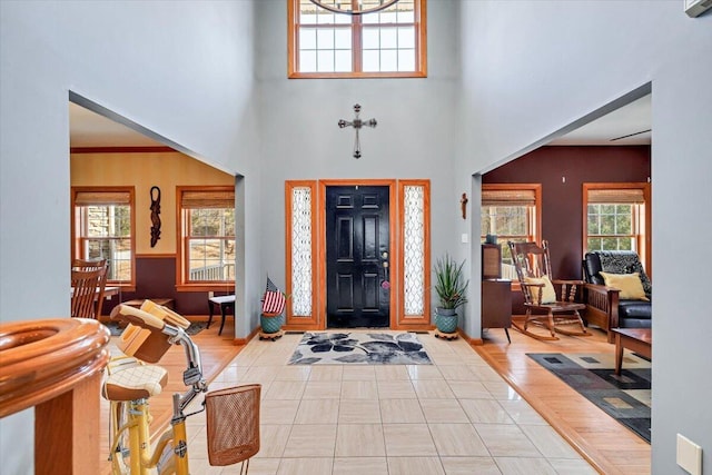 entryway with a towering ceiling