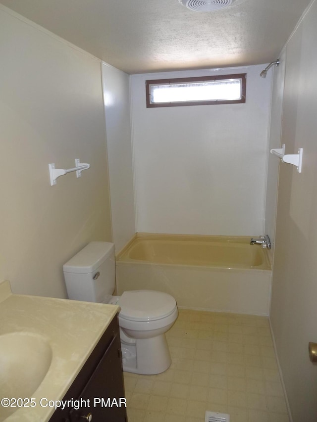 full bathroom featuring shower / bath combination, vanity, toilet, and tile patterned floors