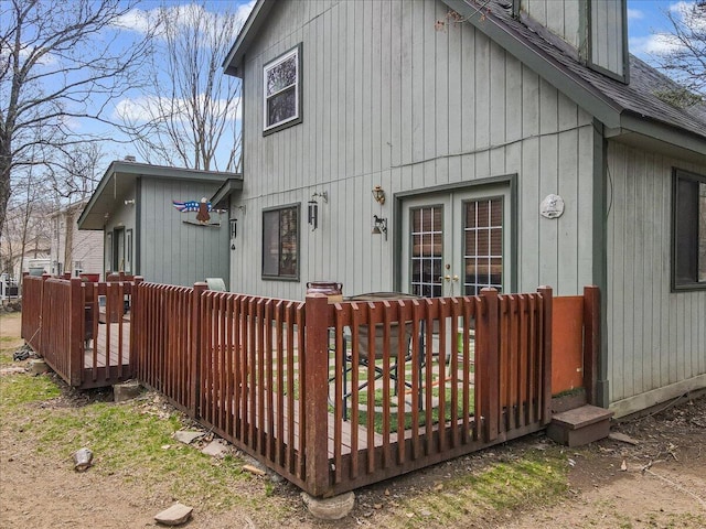 7924 Sleepy Hollow Dr, Tobyhanna, PA 18466 - exterior space featuring french doors, roof with shingles, and a deck