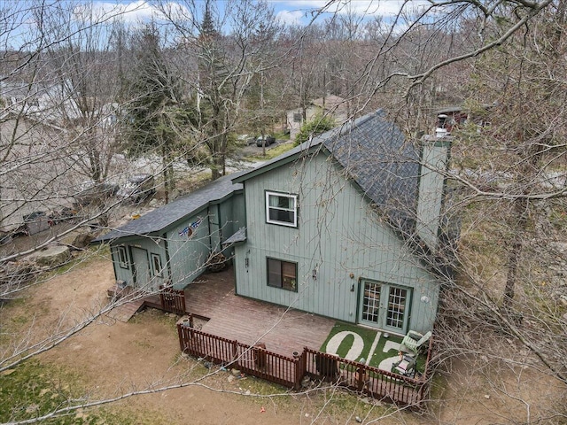 7924 Sleepy Hollow Dr, Tobyhanna, PA 18466 - rear view of property featuring a shingled roof, a wooden deck, and french doors