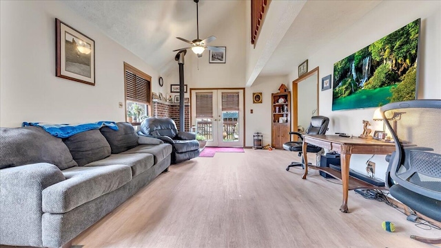 7924 Sleepy Hollow Dr, Tobyhanna, PA 18466 - living room with high vaulted ceiling, ceiling fan, and light wood finished floors