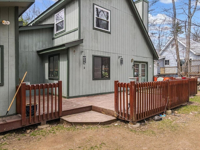 7924 Sleepy Hollow Dr, Tobyhanna, PA 18466 - back of property with a wooden deck and a chimney
