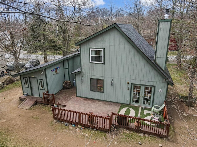 7924 Sleepy Hollow Dr, Tobyhanna, PA 18466 - rear view of property featuring a chimney, french doors, roof with shingles, and a wooden deck