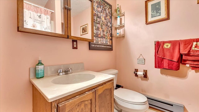 7924 Sleepy Hollow Dr, Tobyhanna, PA 18466 - bathroom featuring a shower with curtain, vanity, a baseboard heating unit, and toilet