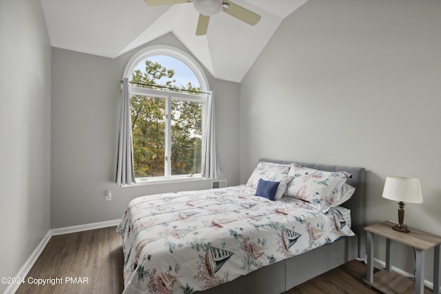 bedroom with lofted ceiling, ceiling fan, wood finished floors, visible vents, and baseboards