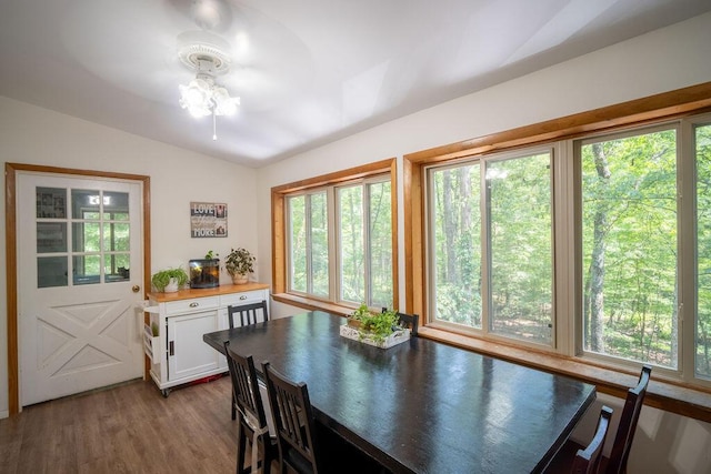 243 R Own Rd, East Stroudsburg, PA 18302 - dining area featuring vaulted ceiling, a chandelier, and wood finished floors