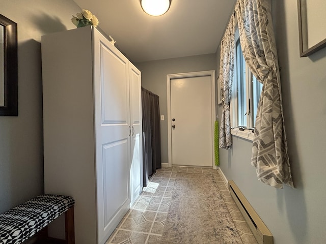 1161 Deer, Pocono Pines, PA 18350 - doorway to outside featuring baseboard heating and baseboards