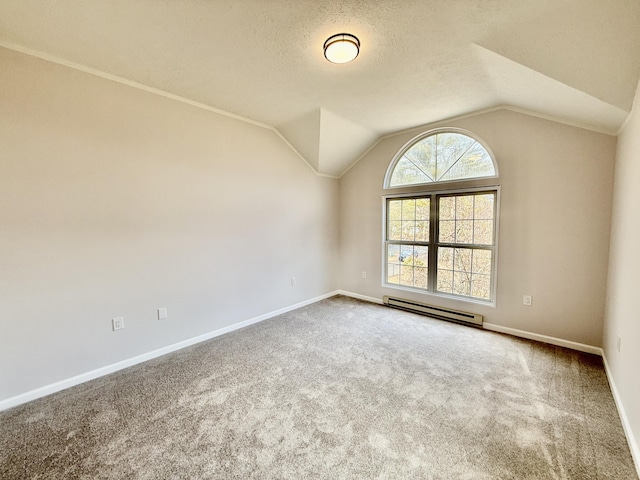 carpeted spare room with lofted ceiling, baseboards, a textured ceiling, and baseboard heating