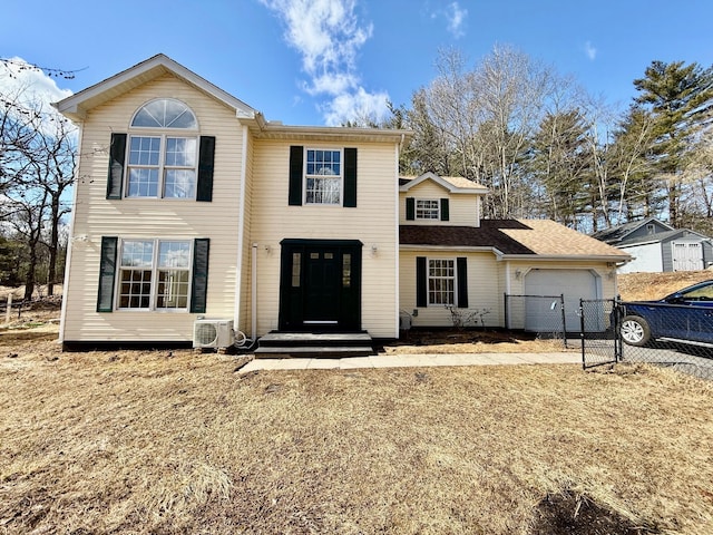 view of front of home with an attached garage, ac unit, and fence