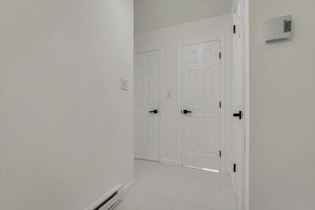 113 Dennis Ct, East Stroudsburg, PA 18301 - hallway with light tile patterned flooring and baseboards