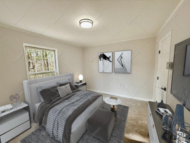 bedroom with ornamental molding