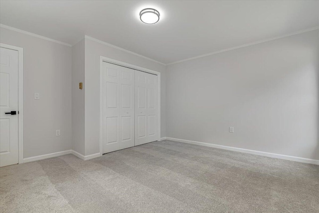 113 Dennis Ct, East Stroudsburg, PA 18301 - unfurnished bedroom featuring crown molding, carpet, and a closet