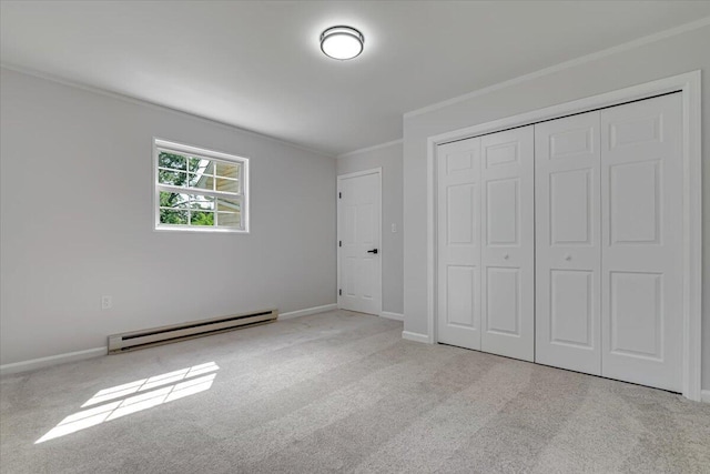 113 Dennis Ct, East Stroudsburg, PA 18301 - unfurnished bedroom with a baseboard radiator, crown molding, a closet, and carpet floors