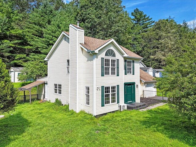 113 Dennis Ct, East Stroudsburg, PA 18301 - view of side of home with a chimney and a garage