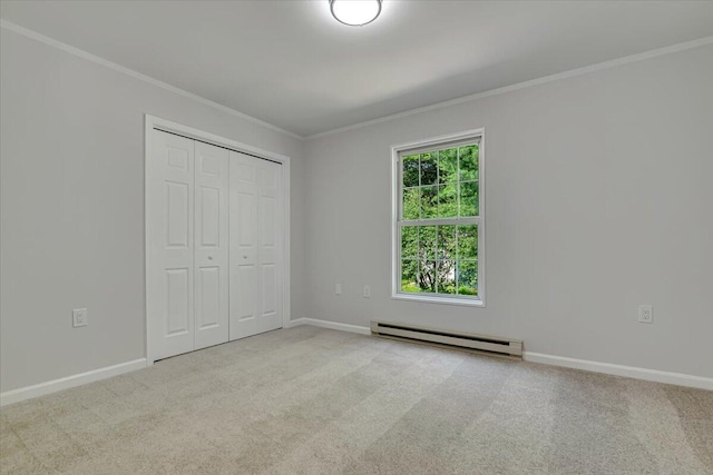 113 Dennis Ct, East Stroudsburg, PA 18301 - unfurnished bedroom with a baseboard radiator, crown molding, carpet floors, and a closet