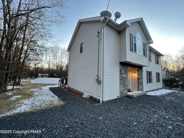 view of snow covered property