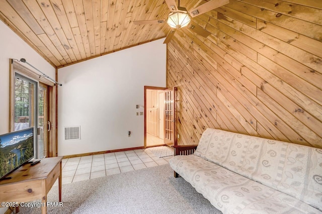 unfurnished room with light tile patterned flooring, crown molding, high vaulted ceiling, wooden ceiling, and wooden walls