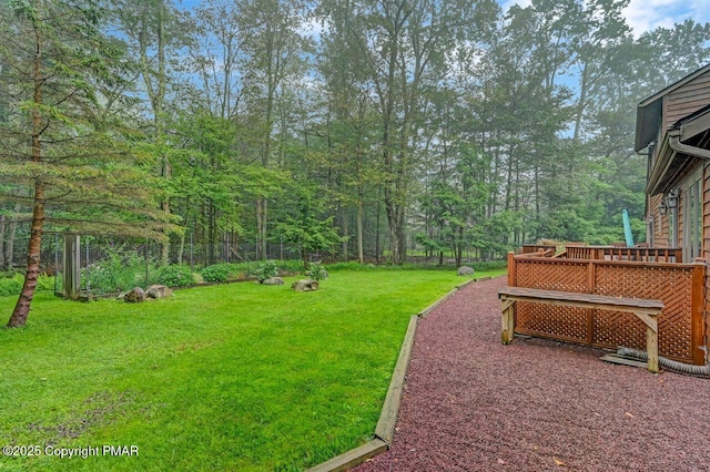 view of yard with a deck