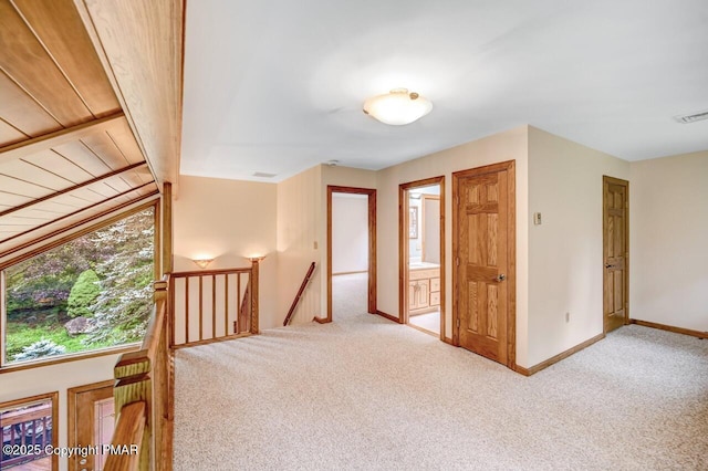 interior space featuring light colored carpet