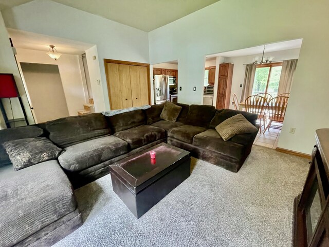 350 Brier Crest Rd, Blakeslee, PA 18610 - living room featuring carpet flooring, a chandelier, and baseboards