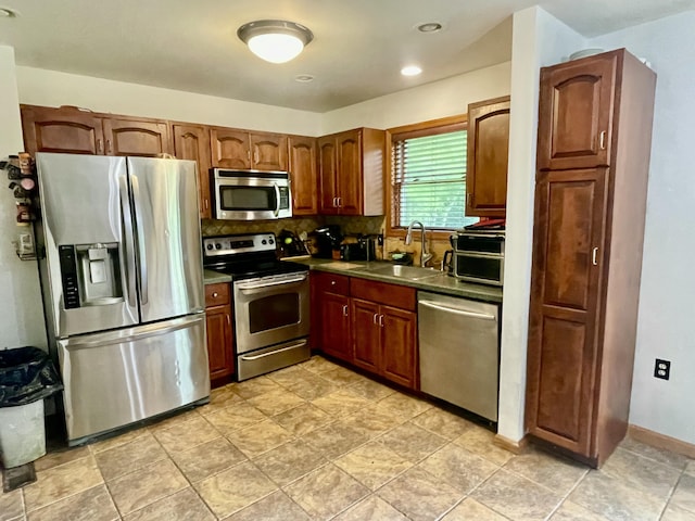350 Brier Crest Rd, Blakeslee, PA 18610 - kitchen with stainless steel appliances, a sink, decorative backsplash, and recessed lighting