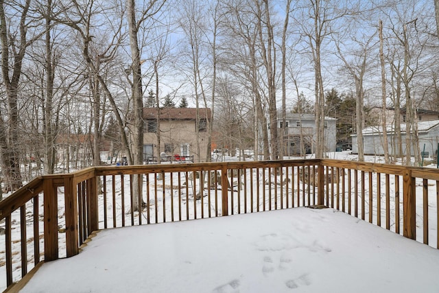 view of snow covered deck