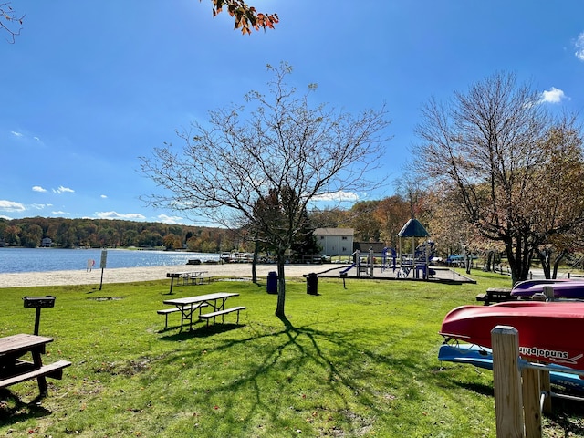 135 Tomhickon Trl, Pocono Lake, PA 18347 - view of community featuring a water view and a lawn