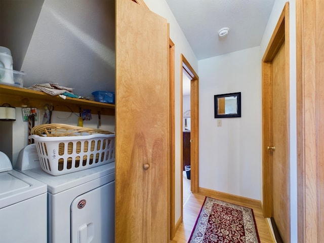 135 Tomhickon Trl, Pocono Lake, PA 18347 - laundry room featuring light wood finished floors and independent washer and dryer