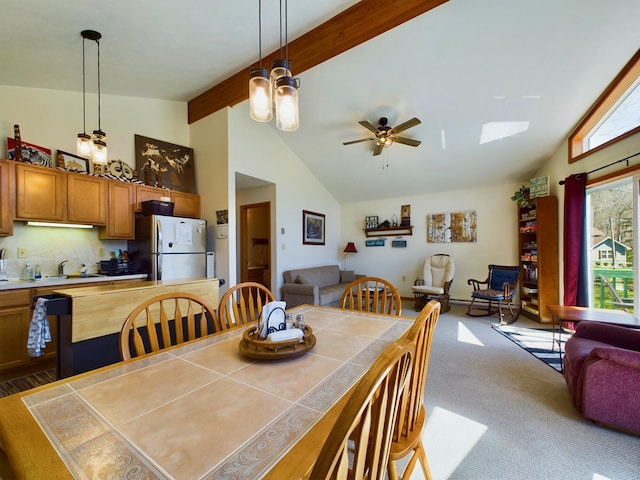 135 Tomhickon Trl, Pocono Lake, PA 18347 - carpeted dining area featuring beam ceiling, a ceiling fan, and high vaulted ceiling