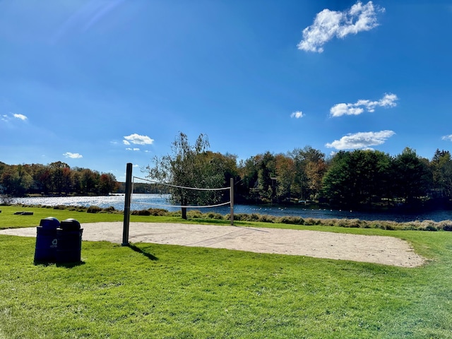 135 Tomhickon Trl, Pocono Lake, PA 18347 - surrounding community featuring volleyball court, a water view, and a lawn