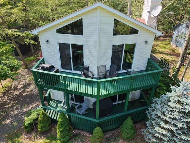 135 Tomhickon Trl, Pocono Lake, PA 18347 - back of house with a wooden deck and a chimney
