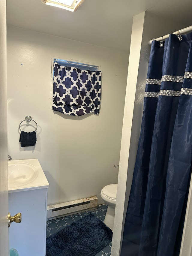 1010 Knollwood Dr, Tobyhanna, PA 18466 - full bathroom with a baseboard radiator, toilet, tile patterned flooring, vanity, and a shower with shower curtain