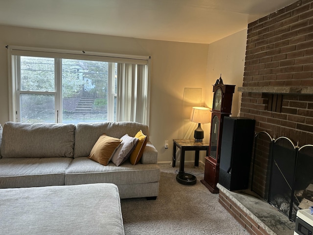 1010 Knollwood Dr, Tobyhanna, PA 18466 - carpeted living room featuring a brick fireplace and baseboards