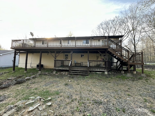 1010 Knollwood Dr, Tobyhanna, PA 18466 - back of house featuring a wooden deck and stairs