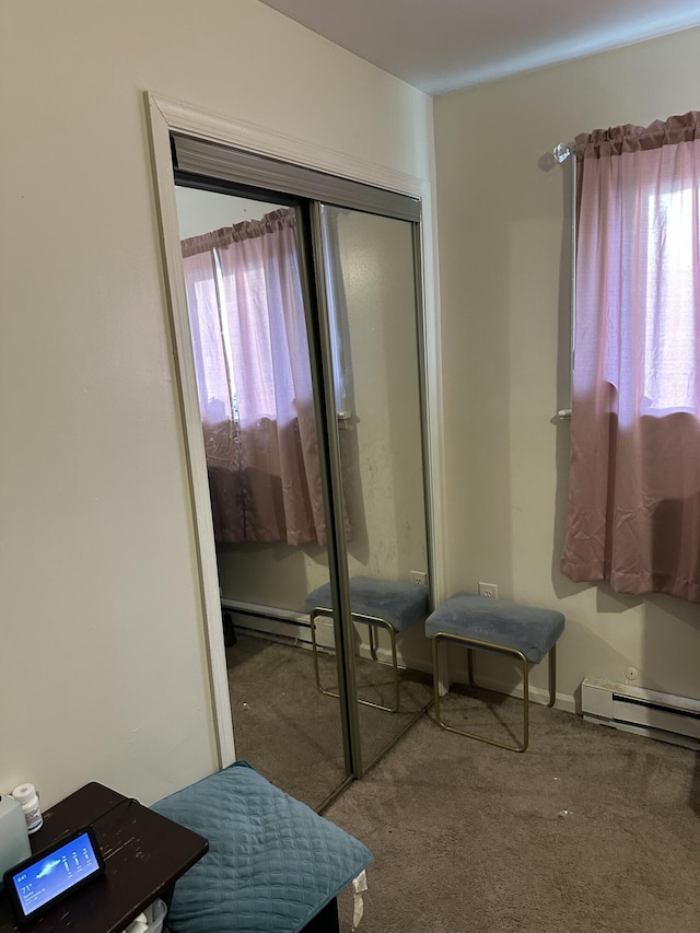 1010 Knollwood Dr, Tobyhanna, PA 18466 - carpeted bedroom featuring a baseboard heating unit and a closet