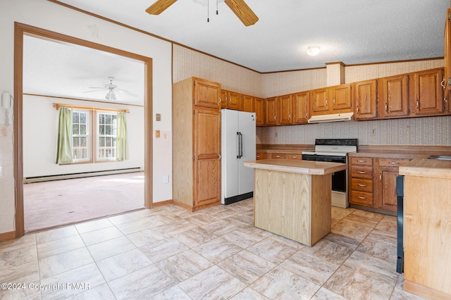 kitchen featuring under cabinet range hood, a baseboard heating unit, electric range, freestanding refrigerator, and wallpapered walls